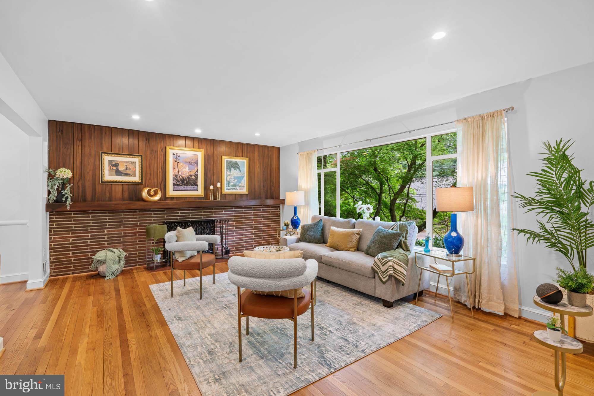 8008 Park Crest Drive Silver Spring, MD 20910 - Photo 2 of 42 a living room with furniture and a large window