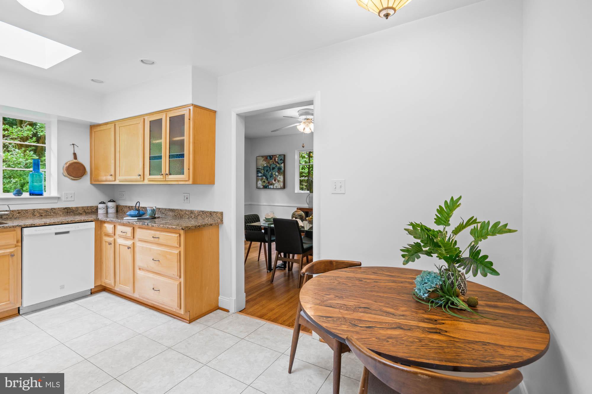 8008 Park Crest Drive Silver Spring, MD 20910 - Photo 22 of 42 a kitchen with stainless steel appliances granite countertop a sink and a stove