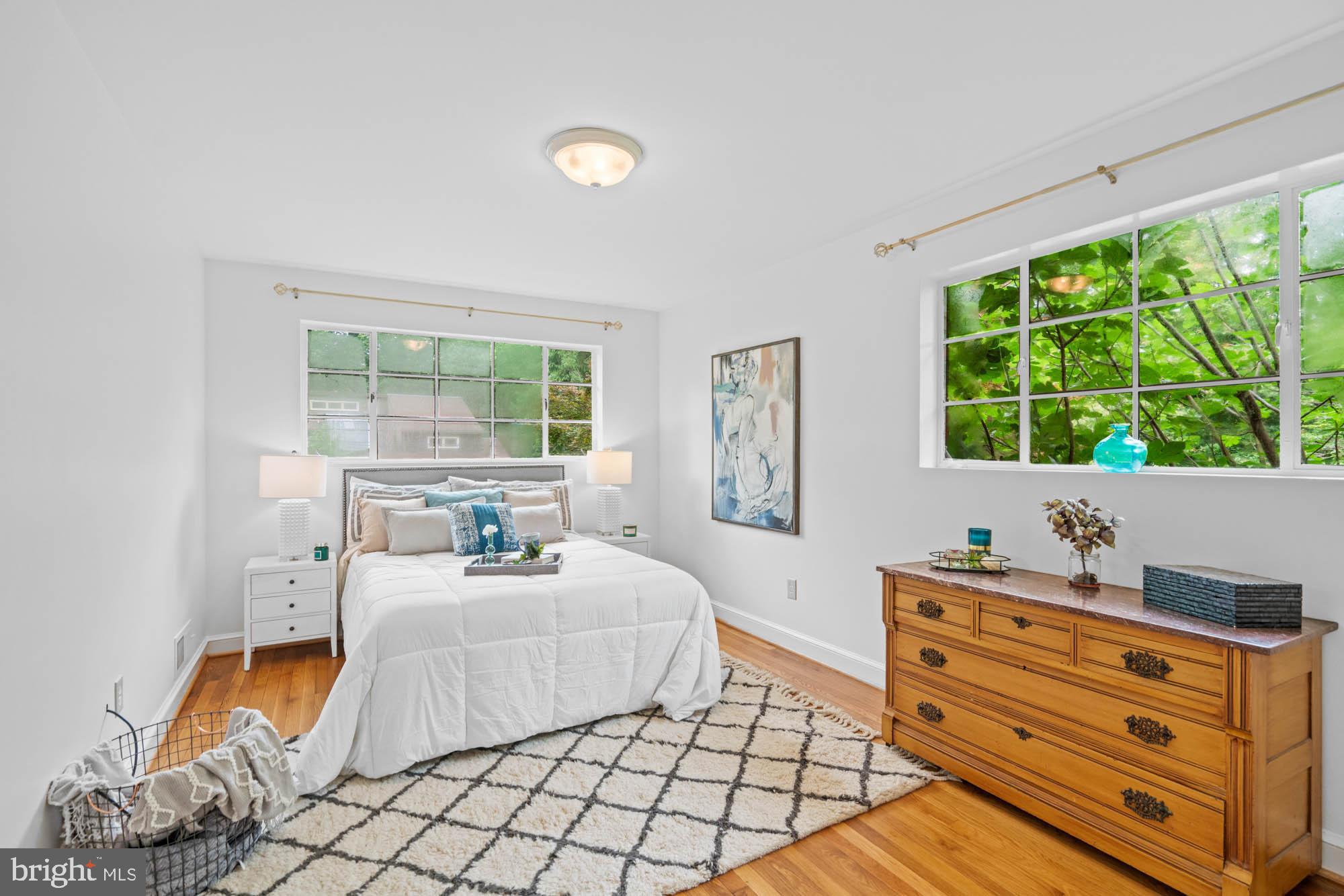 8008 Park Crest Drive Silver Spring, MD 20910 - Photo 30 of 42 a bedroom with furniture and a large window