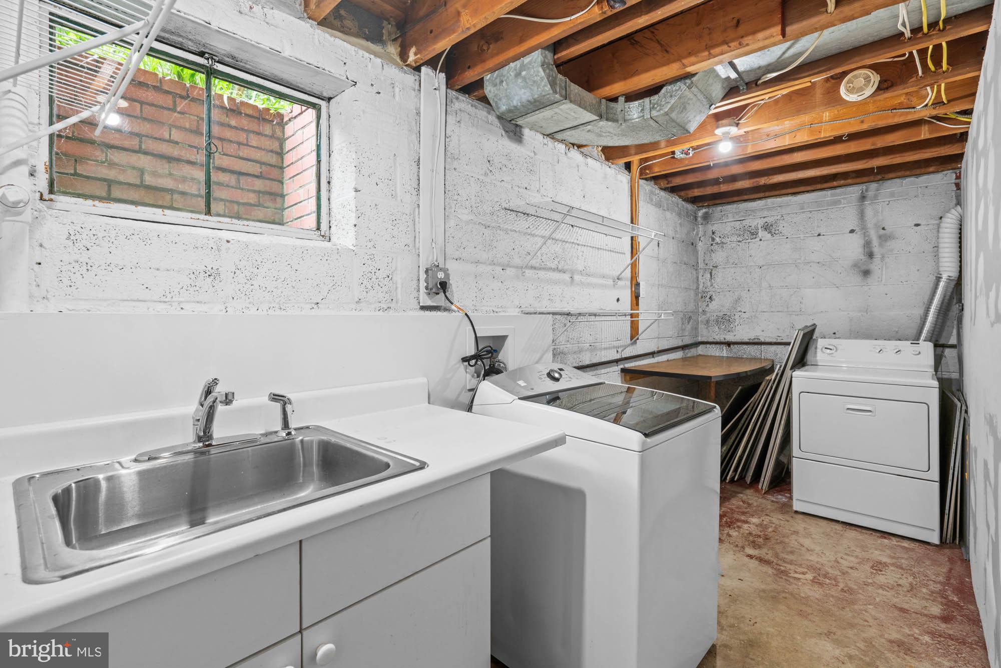 8008 Park Crest Drive Silver Spring, MD 20910 - Photo 38 of 42 a utility room with dryer and washer
