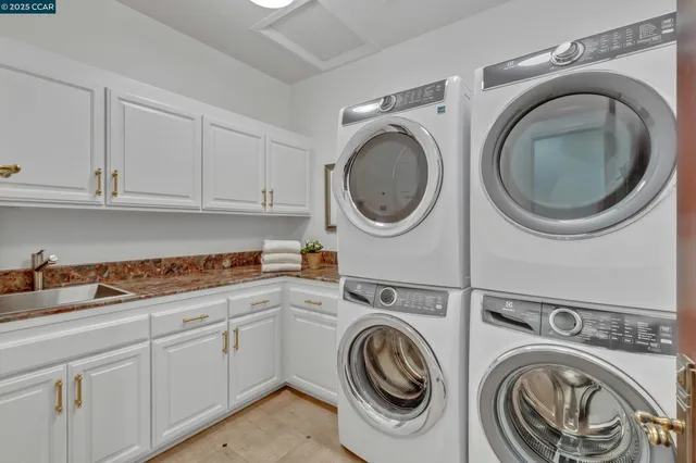 a view of a house with swimming pool and sitting area