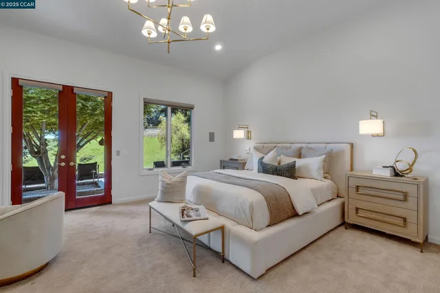 a view of a terrace with wooden floor and outdoor seating
