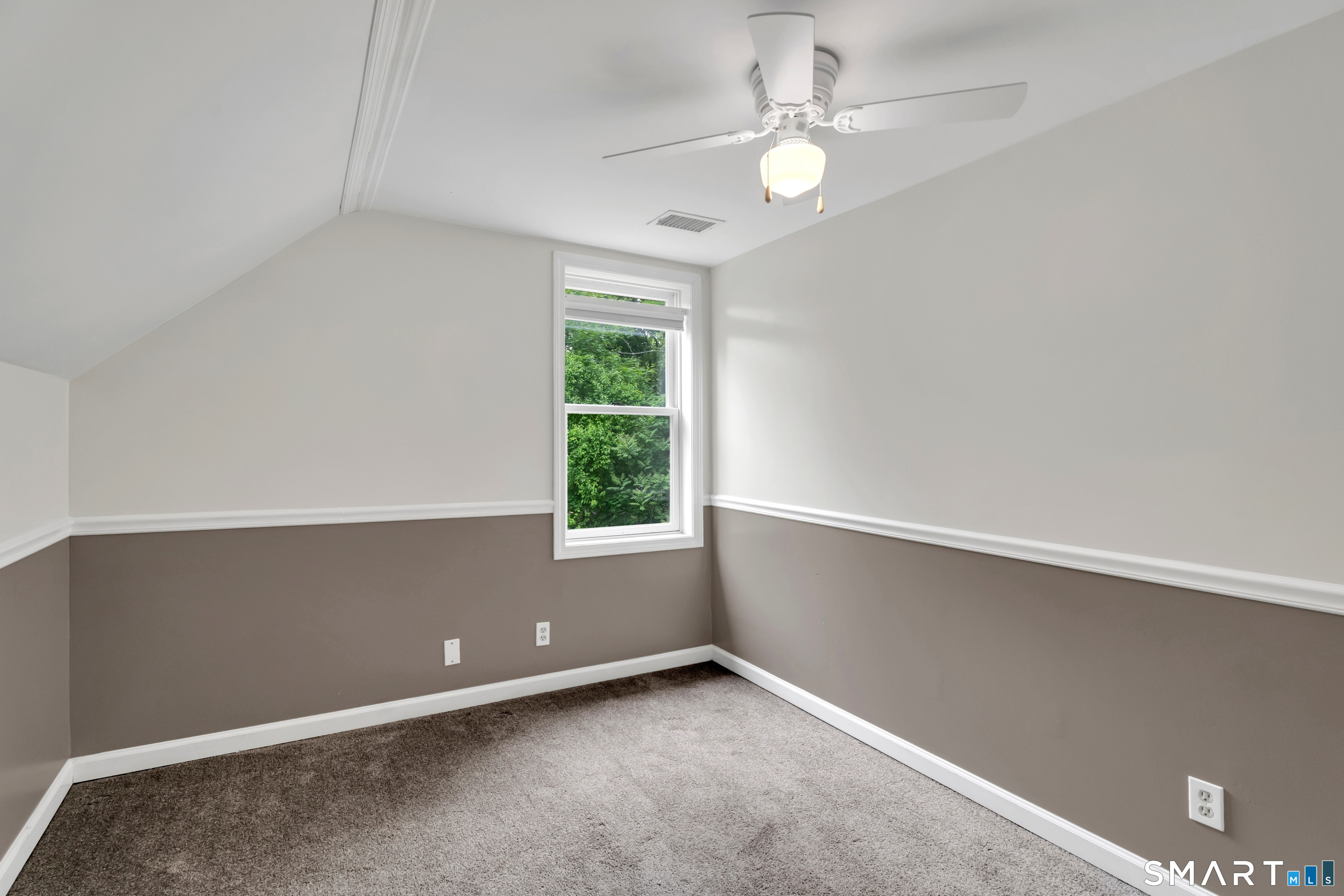 75 Summit Street Norwich, CT 06360 - Photo 27 of 40 an empty room with windows and fan