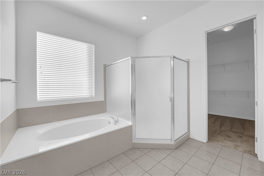 2184 Waterton Rivers Drive Henderson, NV 89044 - Photo 22 of 53 Primary Bathroom with Dual Sinks, Garden Tub, and Separate Shower