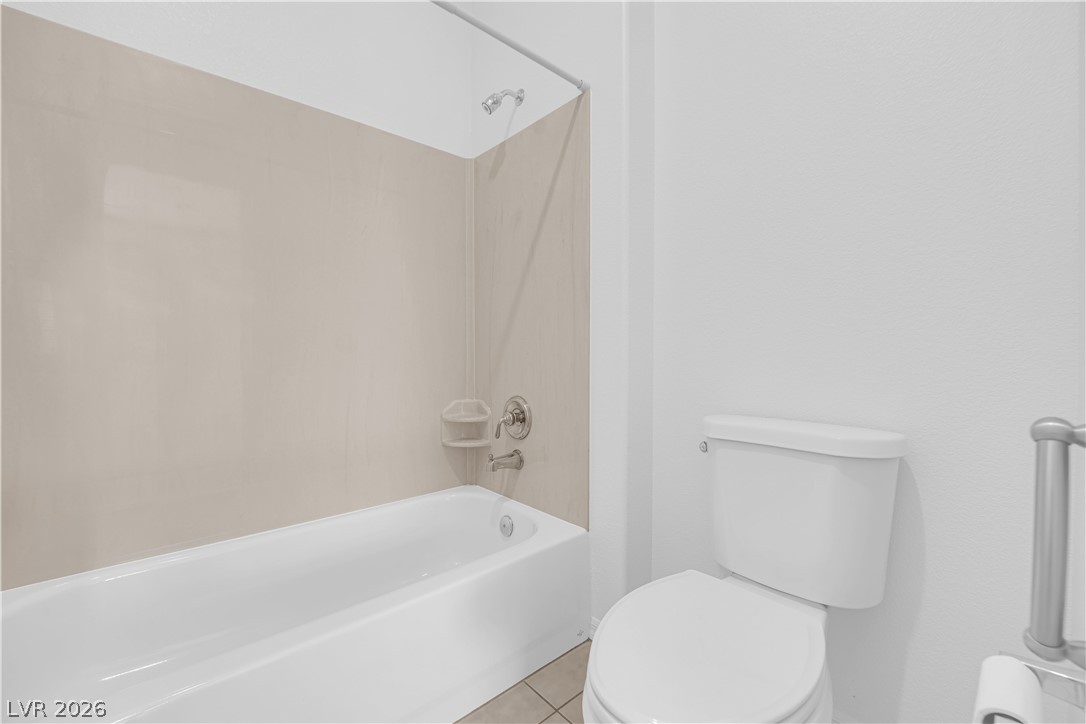 2184 Waterton Rivers Drive Henderson, NV 89044 - Photo 29 of 53 Secondary Bedroom Suite features Ceiling Fan and Private Bathroom with Tub/Shower Combination