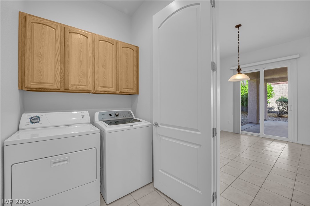2184 Waterton Rivers Drive Henderson, NV 89044 - Photo 30 of 53 Laundry Room with Cabinets, Utility Sink, and Washer & Dryer