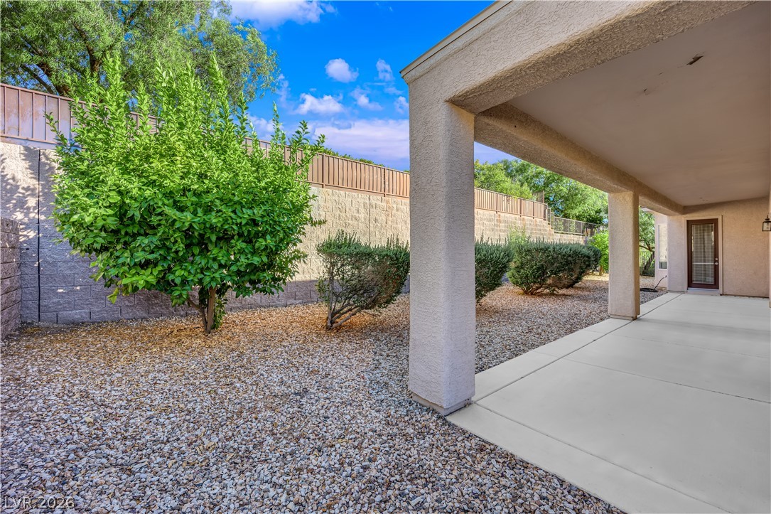 2184 Waterton Rivers Drive Henderson, NV 89044 - Photo 32 of 53 Mature Low Maintenance Landscaping with Rock, Shrubs, and Automatic Irrigation System on Timer