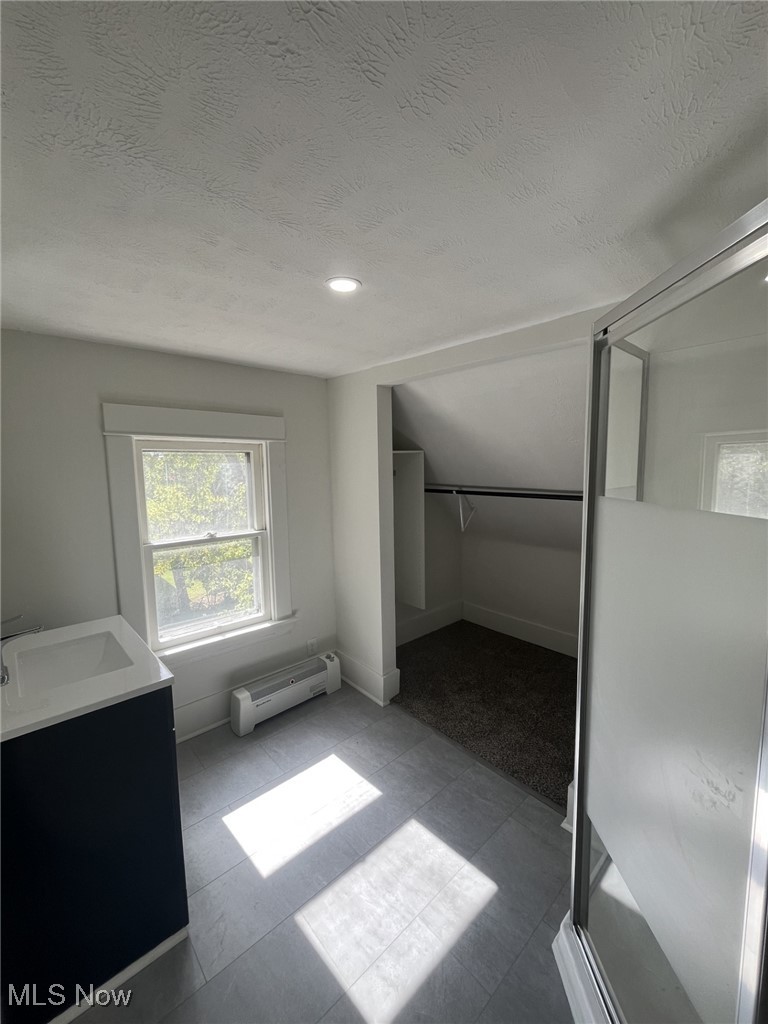 3264 Altamont Road Cleveland, OH 44118 - Photo 19 of 32 Bathroom with new vanity, stand up shower. Also connected to master closet.