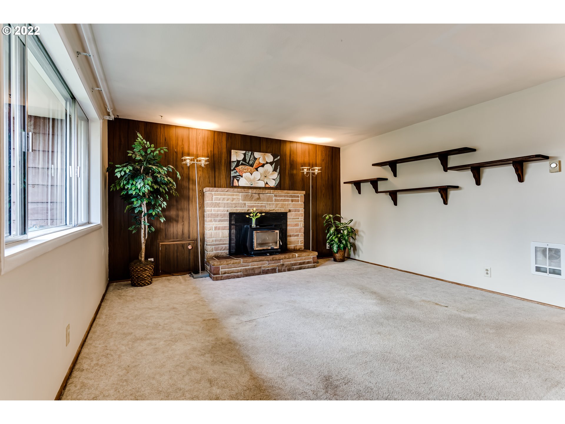 305 37th Street Springfield, OR 97478 - Photo 5 of 18 a view of empty room with furniture and a fireplace