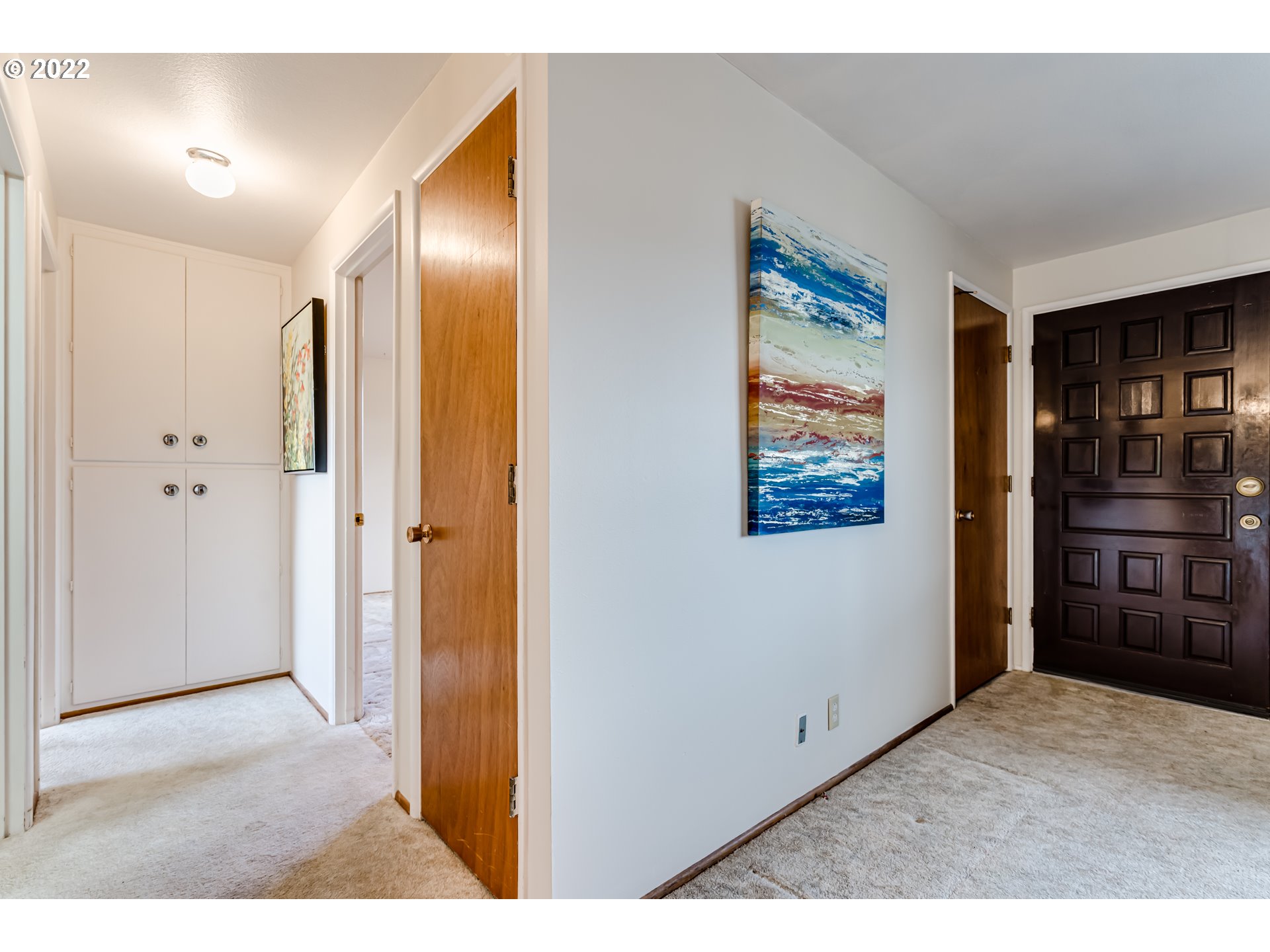 305 37th Street Springfield, OR 97478 - Photo 8 of 18 a view of a hallway with wooden floor