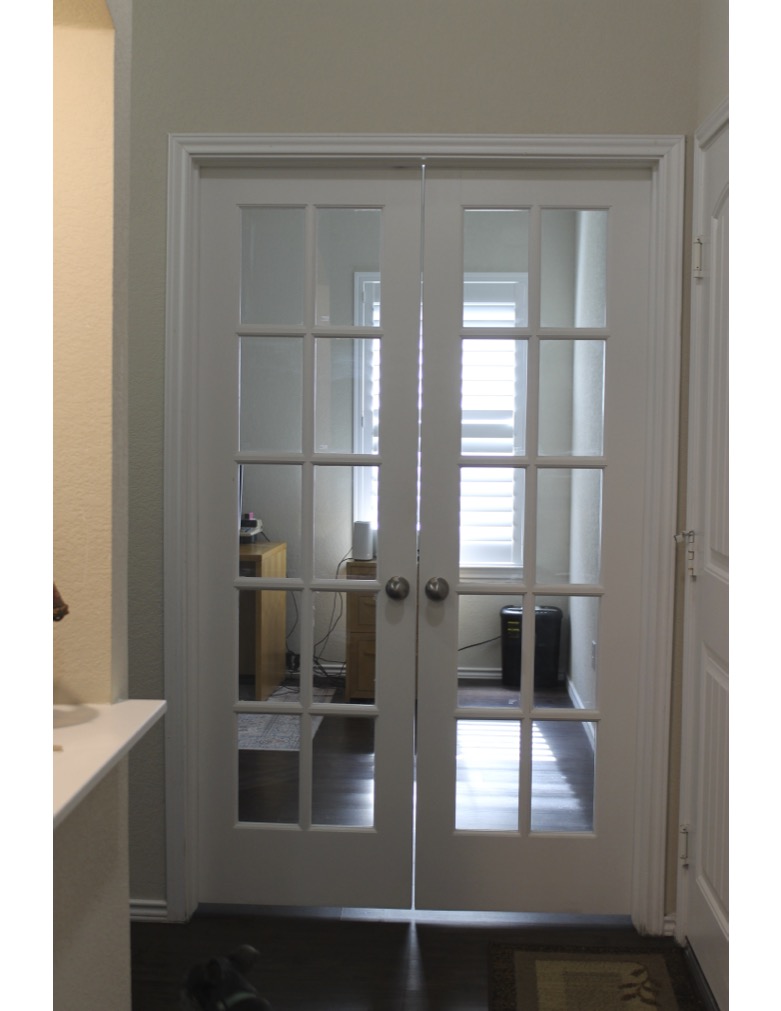 188 Beth Ann Loop Taylor, TX 76574 - Photo 5 of 12 Double French doors open into a bright, versatile interior space.