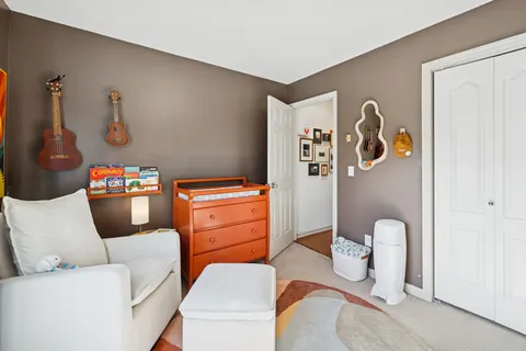 a workspace with wooden floor and a window