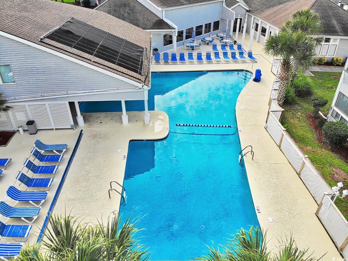 351 Lake Arrowhead Road, Unit 2206 Myrtle Beach, SC 29572 - Photo 24 of 40 Community pool featuring a patio area