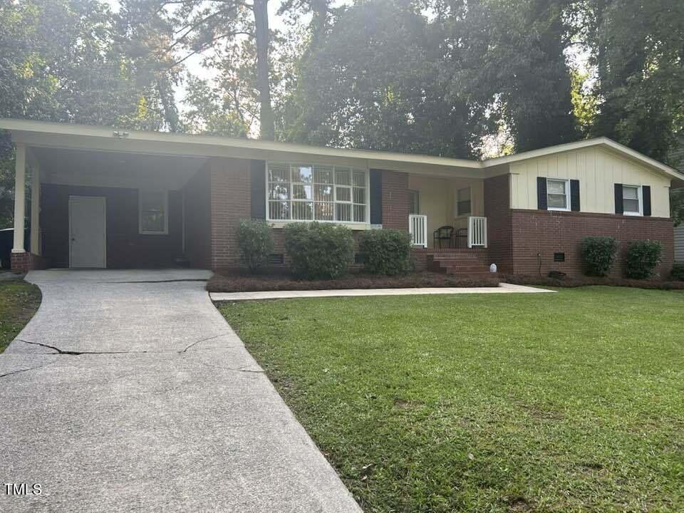 1608 Sulgrave Road Greenville, NC 27858 - Photo 1 of 31 a front view of house with yard and green space