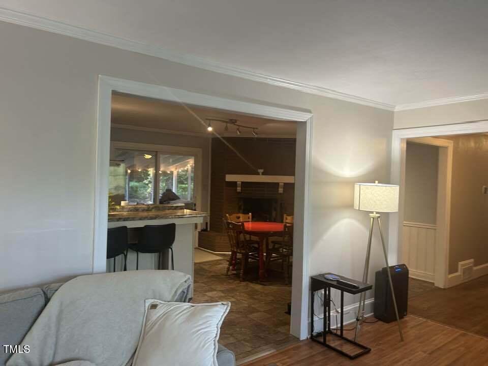 1608 Sulgrave Road Greenville, NC 27858 - Photo 14 of 31 a living room with furniture a lamp and large window