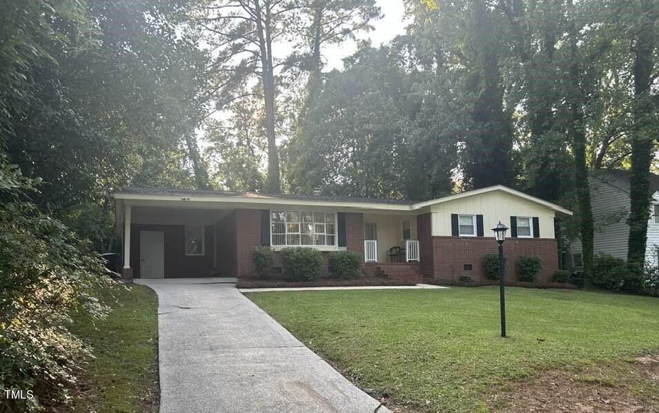 1608 Sulgrave Road Greenville, NC 27858 - Photo 2 of 31 a front view of house with yard and green space