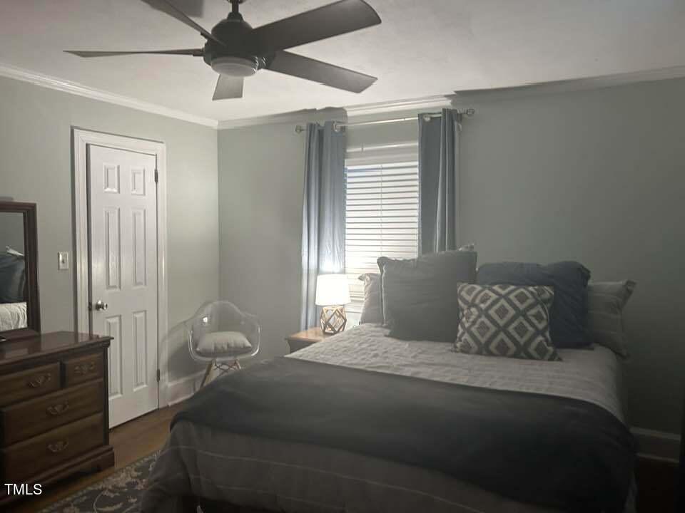 1608 Sulgrave Road Greenville, NC 27858 - Photo 22 of 31 a bedroom with a bed and a window