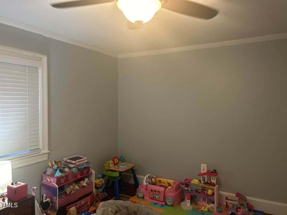 1608 Sulgrave Road Greenville, NC 27858 - Photo 25 of 31 a room with toys and a table chair