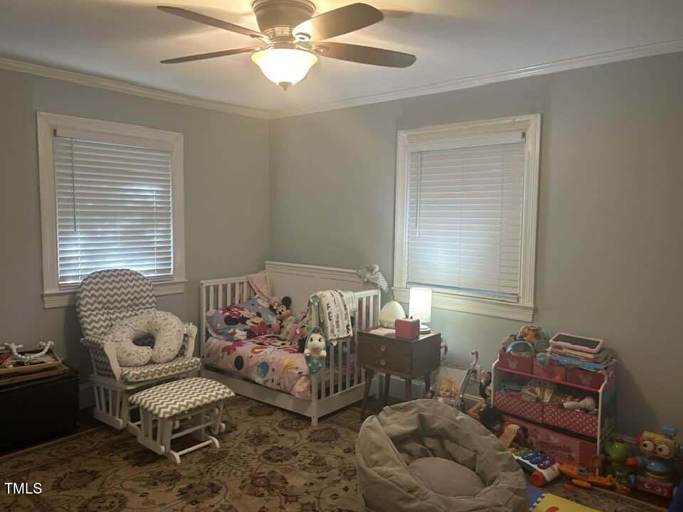 1608 Sulgrave Road Greenville, NC 27858 - Photo 26 of 31 a bedroom with furniture and a window