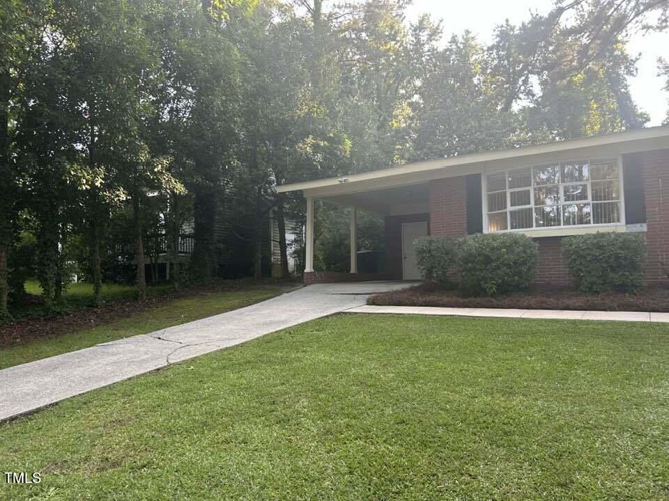 1608 Sulgrave Road Greenville, NC 27858 - Photo 3 of 31 front view of a house with a yard