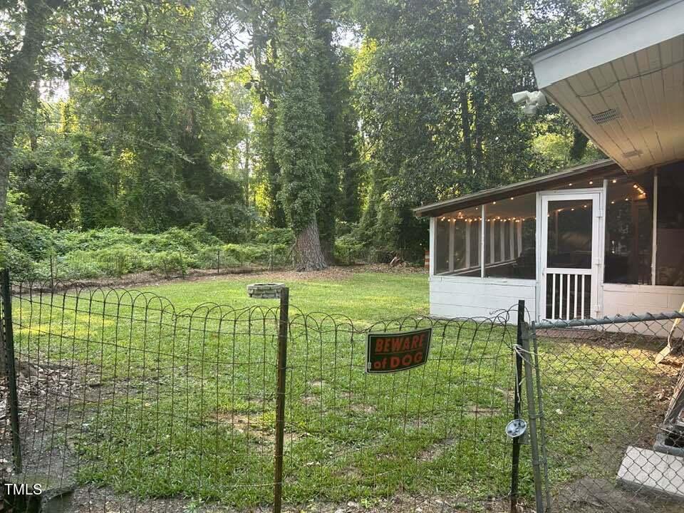 1608 Sulgrave Road Greenville, NC 27858 - Photo 7 of 31 a view of a house with backyard and a trees