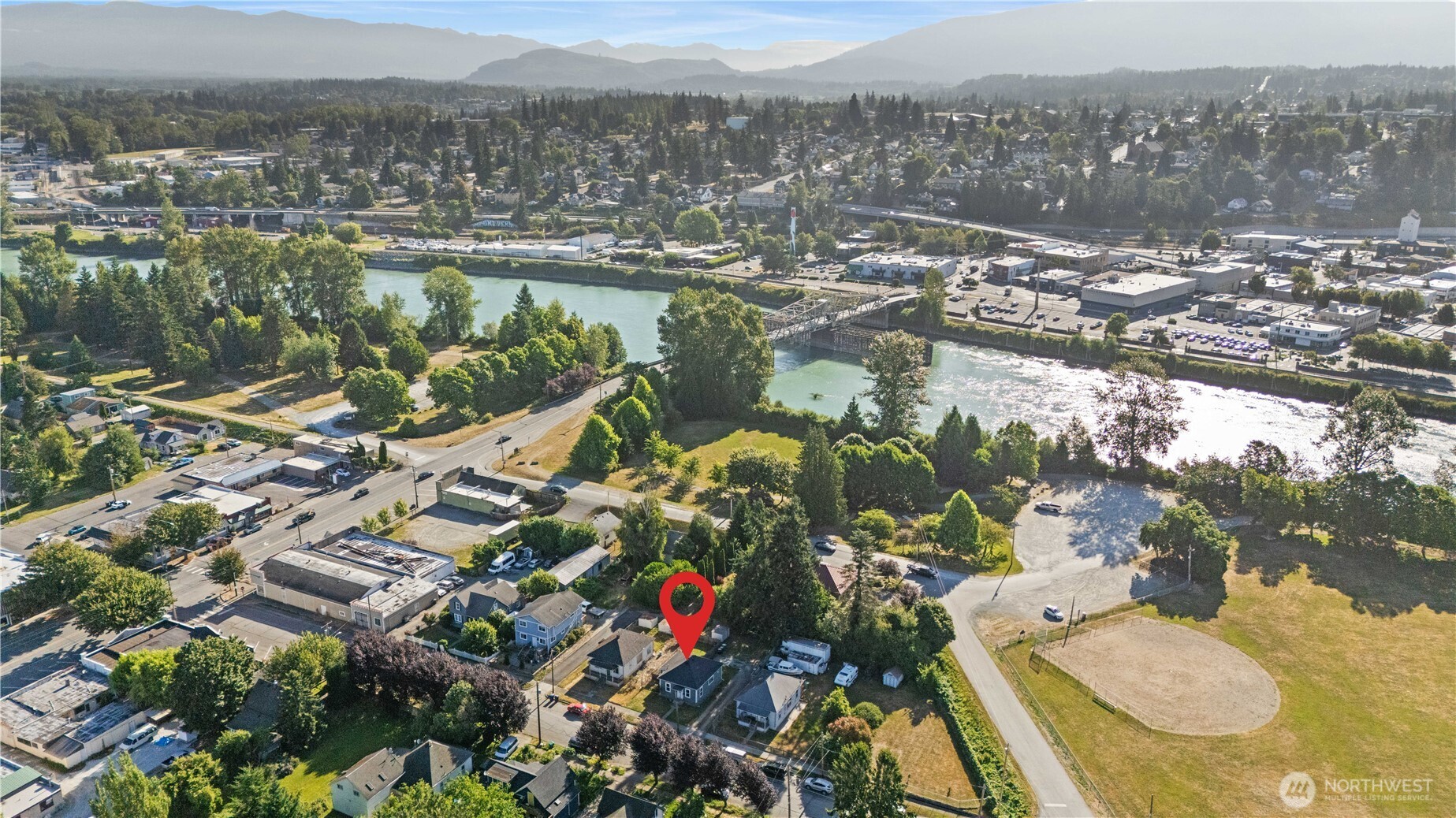 206 South Baker Street Mount Vernon, WA 98273 - Photo 31 of 31 an aerial view of residential houses with outdoor space and river