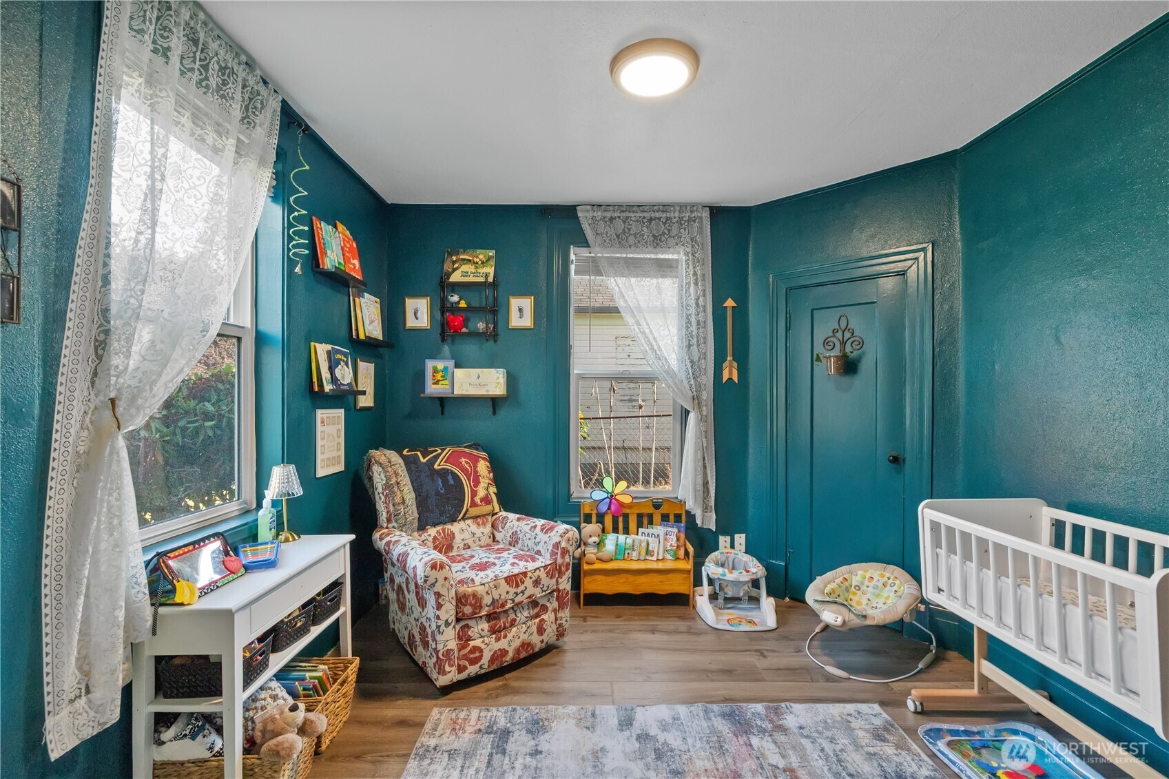 206 South Baker Street Mount Vernon, WA 98273 - Photo 4 of 31 a living room with furniture and a wooden floor