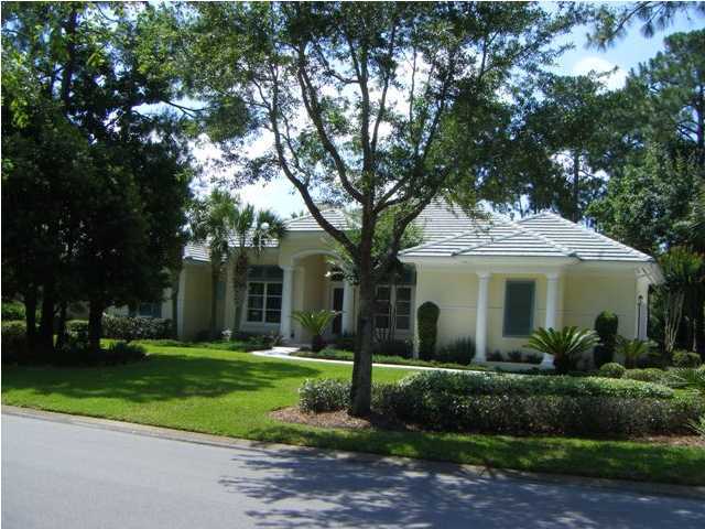 2913 Pine Valley Road Miramar Beach, FL 32550 - Photo 1 of 24 a front view of a house with a yard and trees