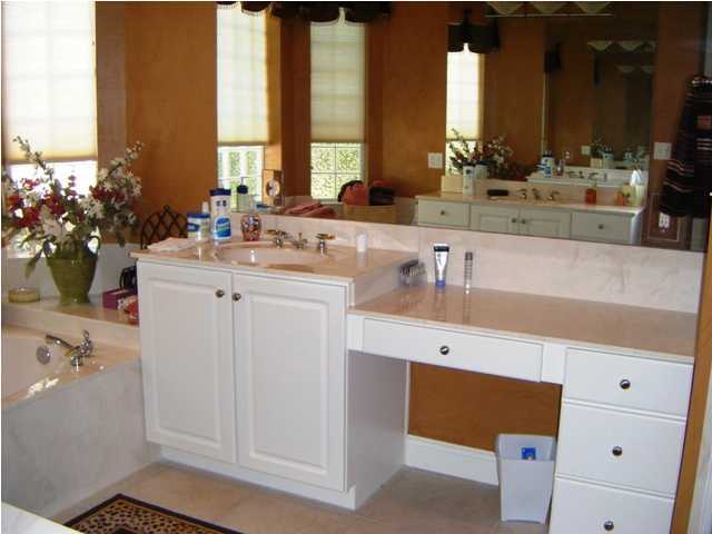 2913 Pine Valley Road Miramar Beach, FL 32550 - Photo 15 of 24 a bathroom with a sink and a mirror