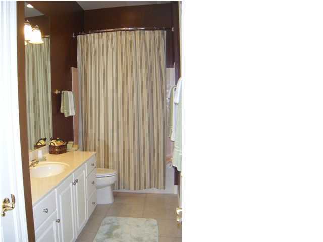 2913 Pine Valley Road Miramar Beach, FL 32550 - Photo 18 of 24 a bathroom with a double vanity sink and a mirror