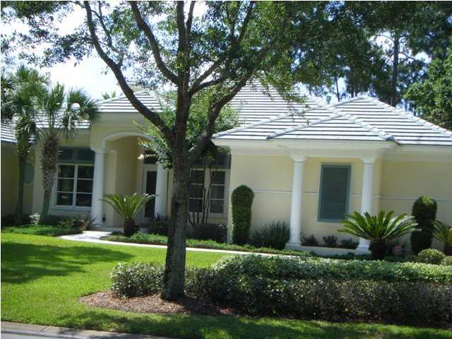 2913 Pine Valley Road Miramar Beach, FL 32550 - Photo 2 of 24 a front view of a house with garden