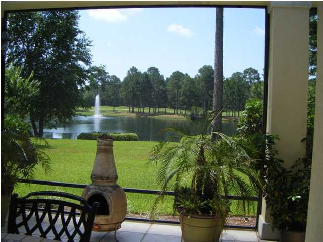 2913 Pine Valley Road Miramar Beach, FL 32550 - Photo 22 of 24 a view of a lake from a garden
