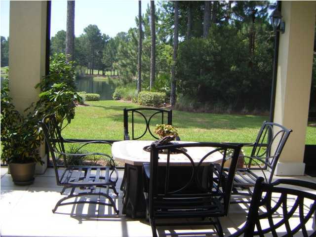 2913 Pine Valley Road Miramar Beach, FL 32550 - Photo 23 of 24 a view of a chairs and table in patio