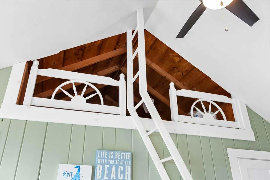 334 Shore Road, Unit 12 Truro, MA 02666 - Photo 13 of 19 a street sign that is on a pole