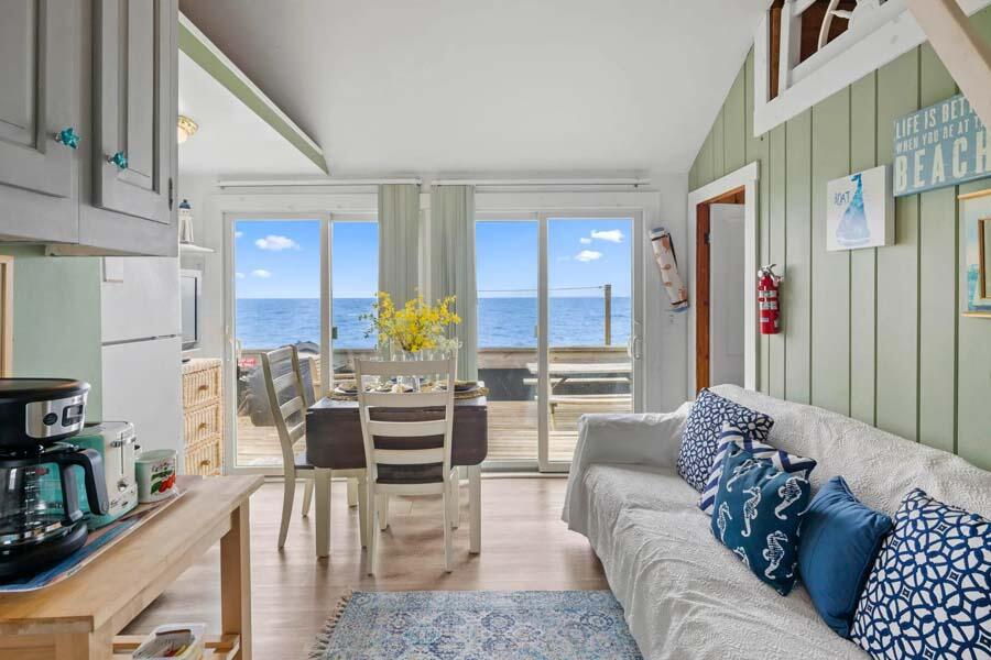 334 Shore Road, Unit 12 Truro, MA 02666 - Photo 10 of 19 a living room with furniture