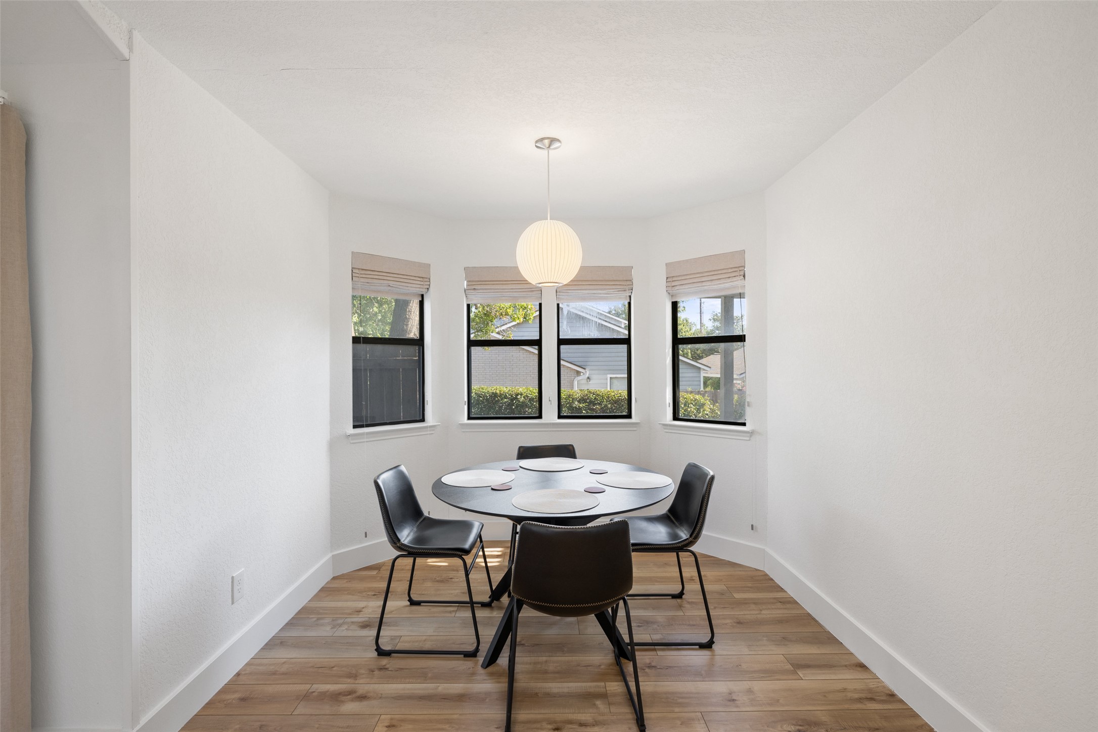 2001 Parker Lane, Unit 101 Austin, TX 78741 - Photo 13 of 33 a view of a dining room with furniture and window