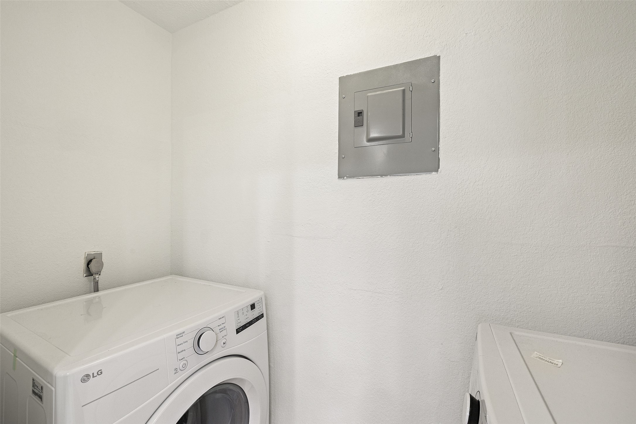 2001 Parker Lane, Unit 101 Austin, TX 78741 - Photo 23 of 33 a view of entryway with washer and dryer