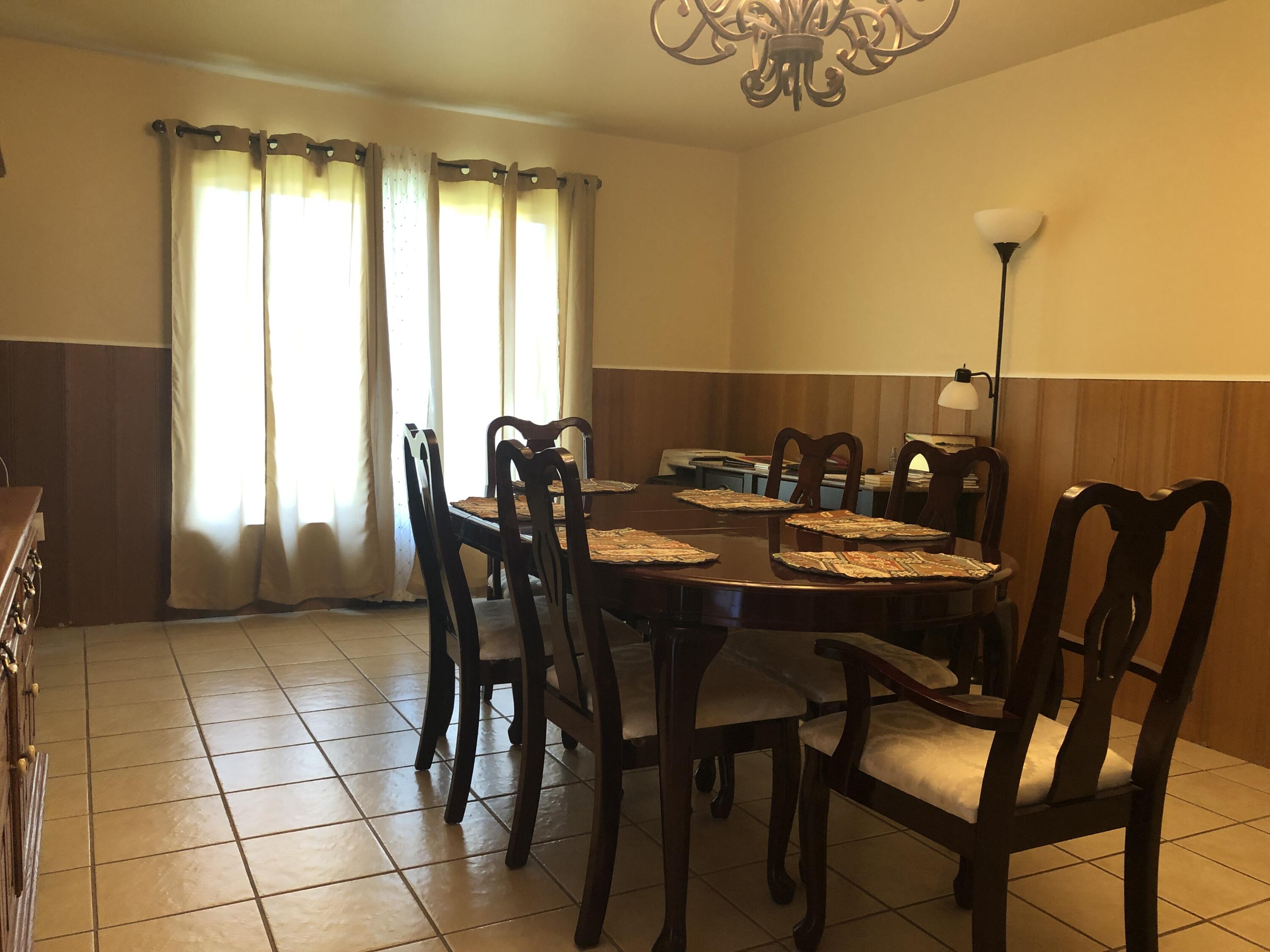 804 South Broadway Plainview, TX 79072 - Photo 12 of 46 a view of a dining room with furniture and window