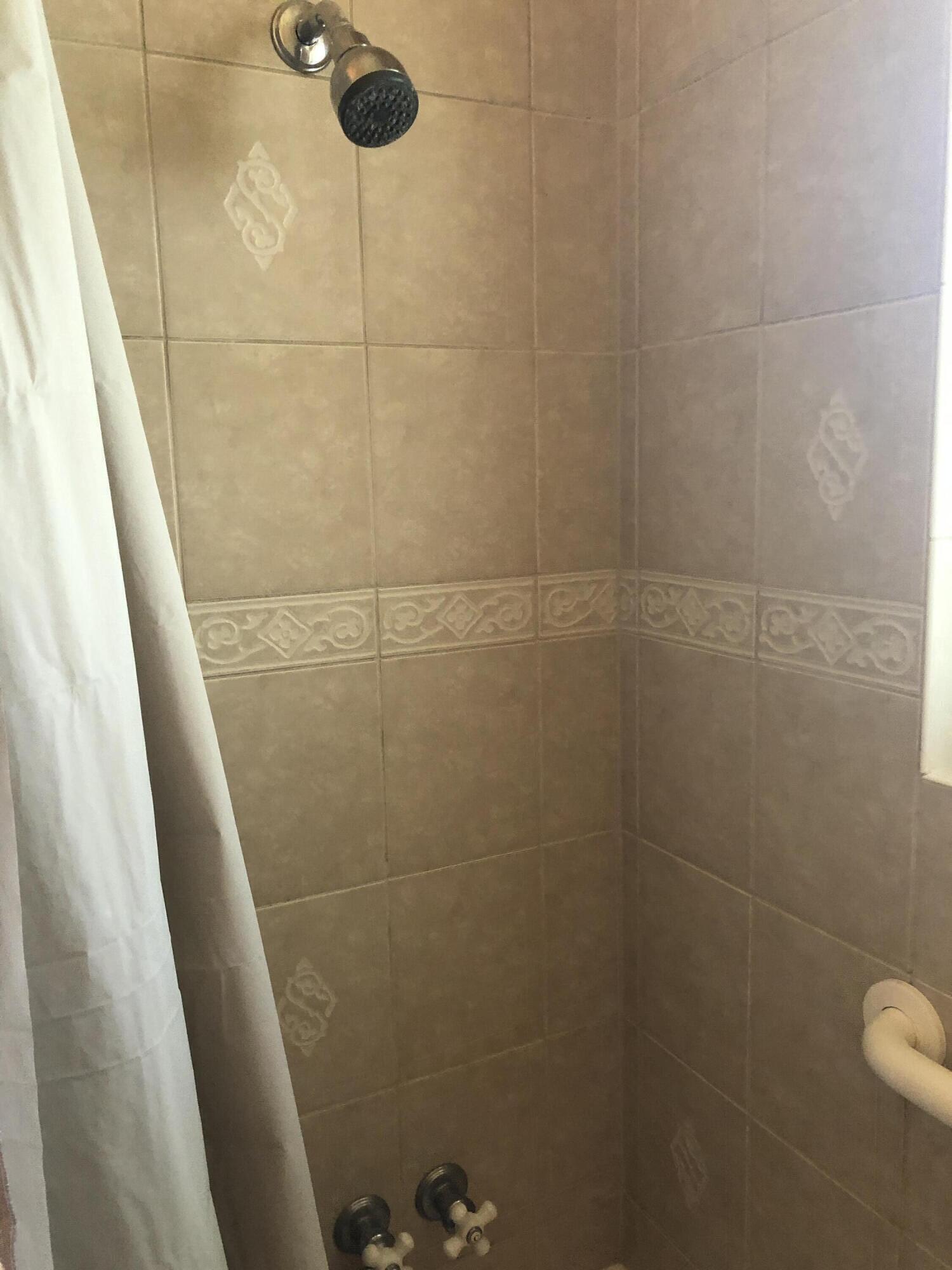 804 South Broadway Plainview, TX 79072 - Photo 22 of 46 a bathroom with a shower