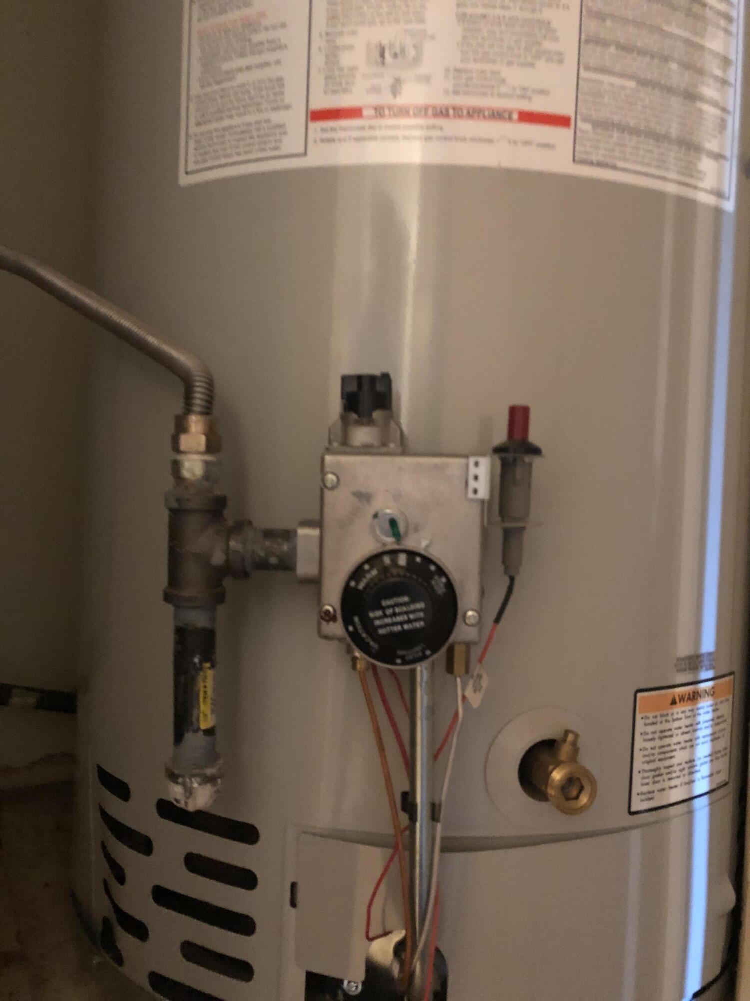 804 South Broadway Plainview, TX 79072 - Photo 34 of 46 a close view of water heater and washer