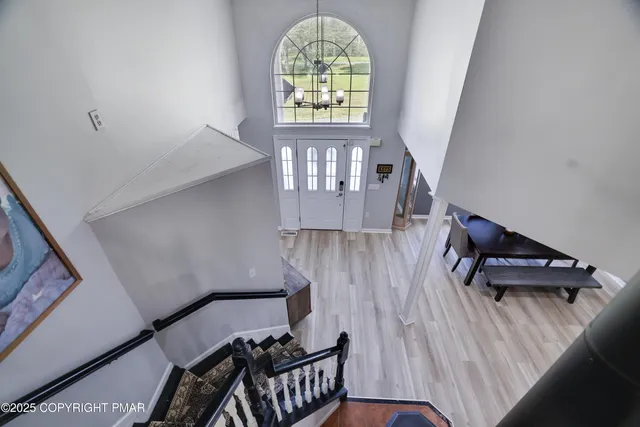 a bedroom with a bed and a tv