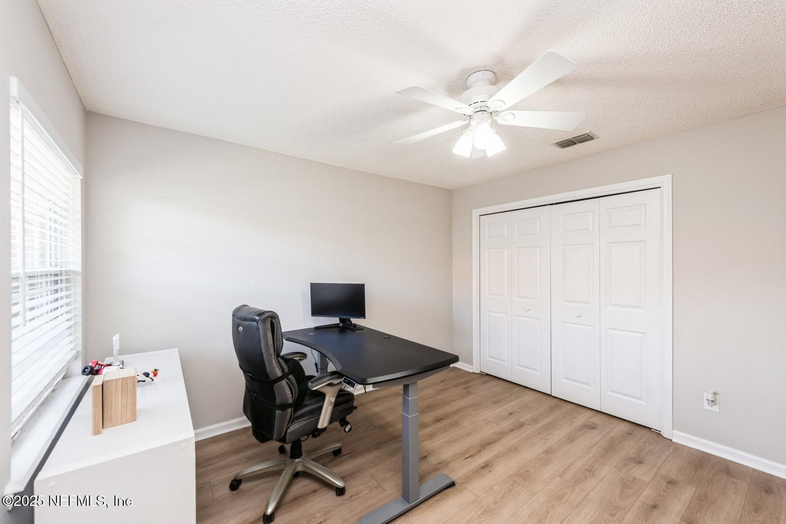 1962 Little River Drive Fleming Island, FL 32003 - Photo 23 of 29 a view of a workspace with furniture and a window