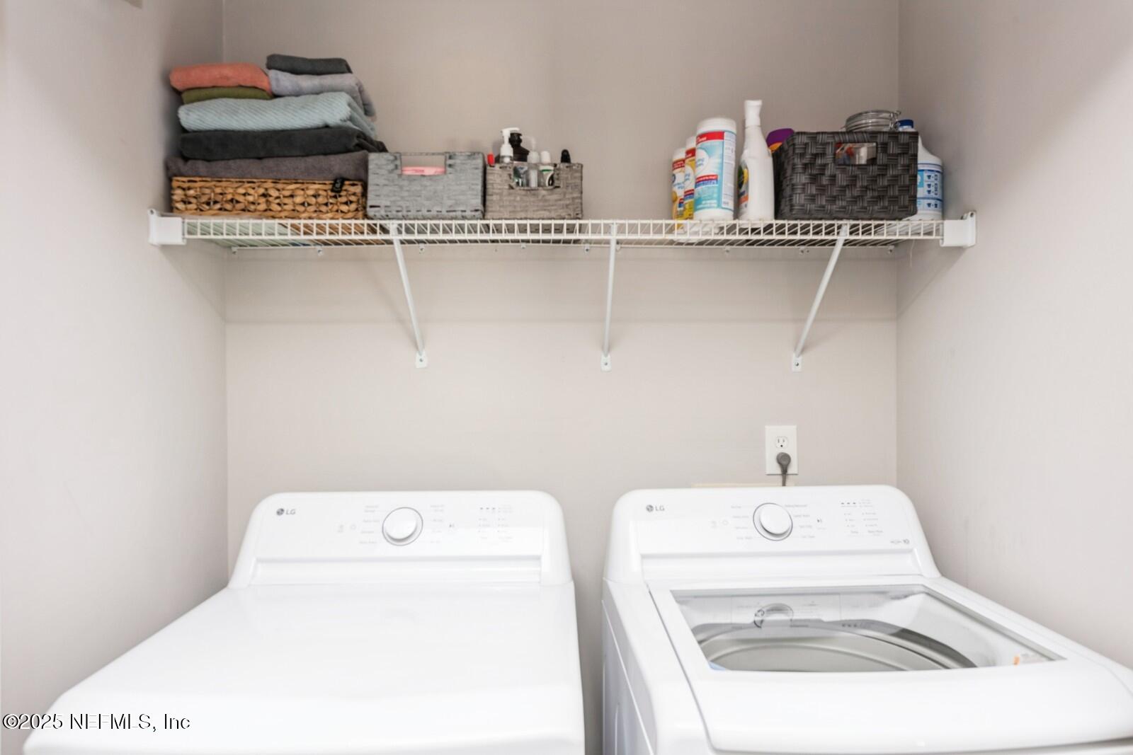 1962 Little River Drive Fleming Island, FL 32003 - Photo 25 of 29 a utility room with dryer and washer