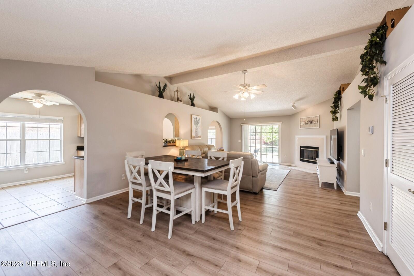 1962 Little River Drive Fleming Island, FL 32003 - Photo 6 of 29 a view of a dining room with furniture window and wooden floor