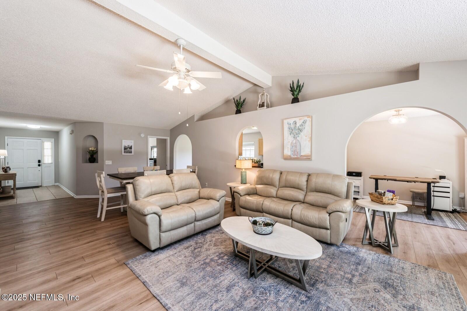 1962 Little River Drive Fleming Island, FL 32003 - Photo 9 of 29 a living room with furniture and a wooden floor