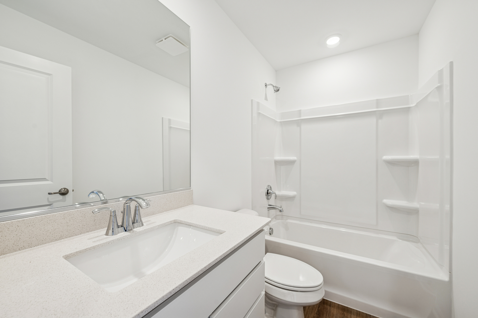 12312 Tinsley Street Huntley, IL 60142 - Photo 15 of 24 a bathroom with a sink a toilet and a large mirror