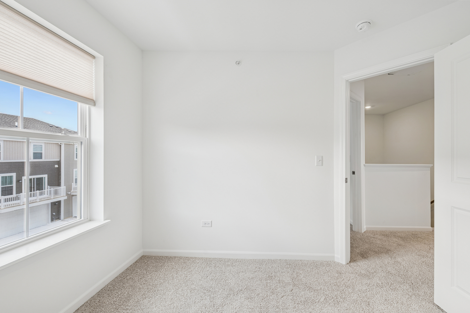 12312 Tinsley Street Huntley, IL 60142 - Photo 21 of 24 an empty room with a window