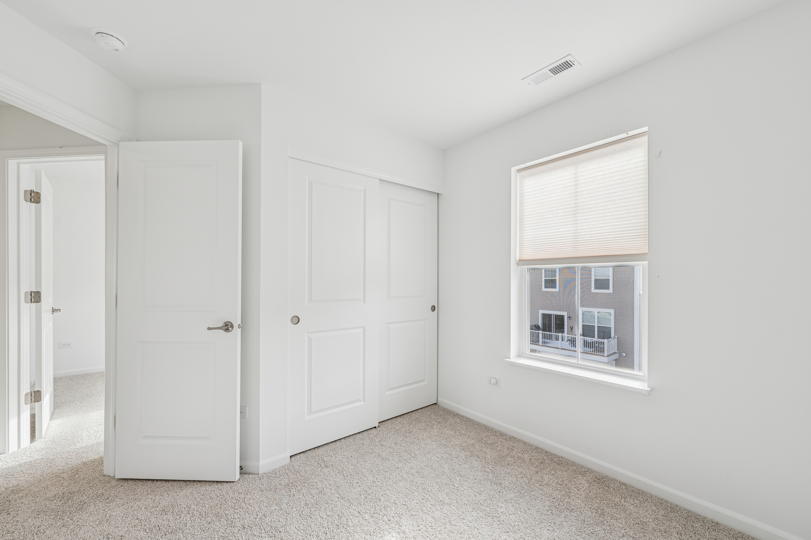 12312 Tinsley Street Huntley, IL 60142 - Photo 22 of 24 a view of an empty room with a window