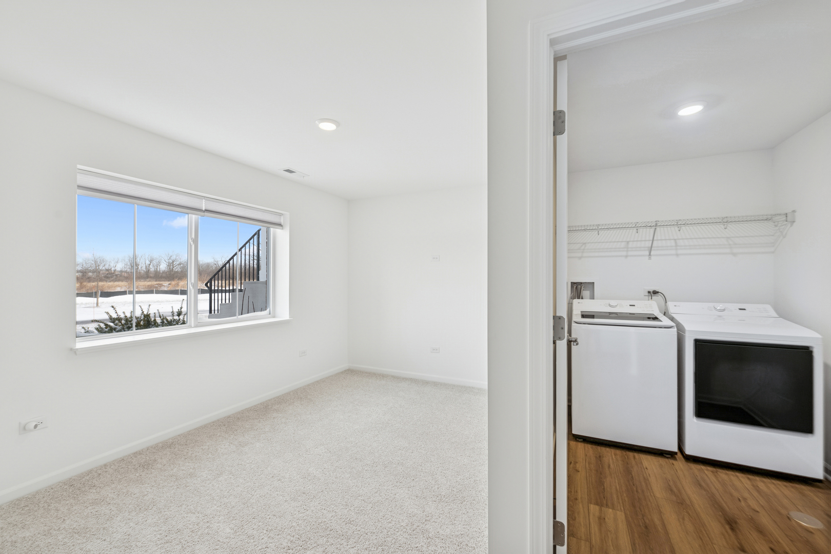 12312 Tinsley Street Huntley, IL 60142 - Photo 3 of 24 a view of a storage & utility room with wooden floor cabinet