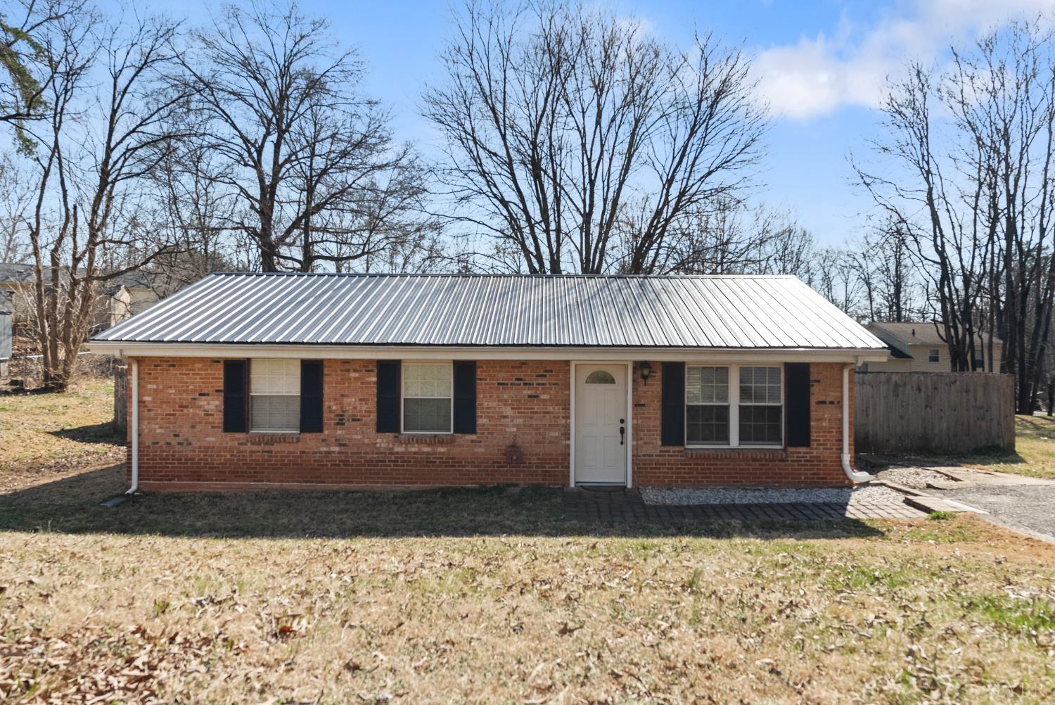 119 Dogwood Street Amherst, VA 24521 - Photo 1 of 37 a front view of a house with a yard